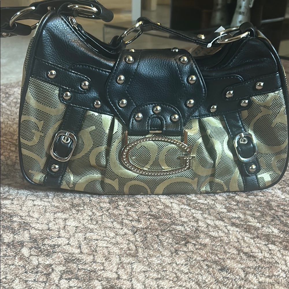 Elegant Gold and Black Shoulder Bag with Edgy Details